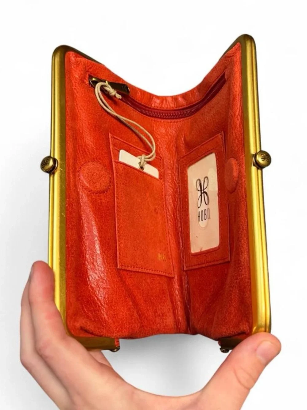 HOBO Orange Leather Kiss-Lock Clutch with Center Stitching